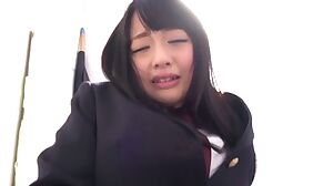 Japanese schoolgirl strips off her panties and masturbates